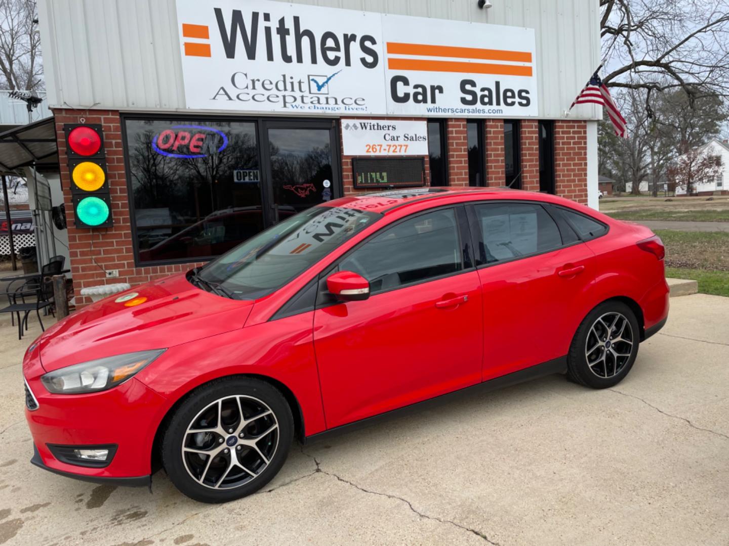 2017 RED /BLACK Ford Focus (1FADP3H29HL) with an 2.0L engine, AUTO transmission, located at 204 Hwy. 16 East, Carthage, MS, 39051, (601) 267-7277, 0.000000, 0.000000 - Photo#0